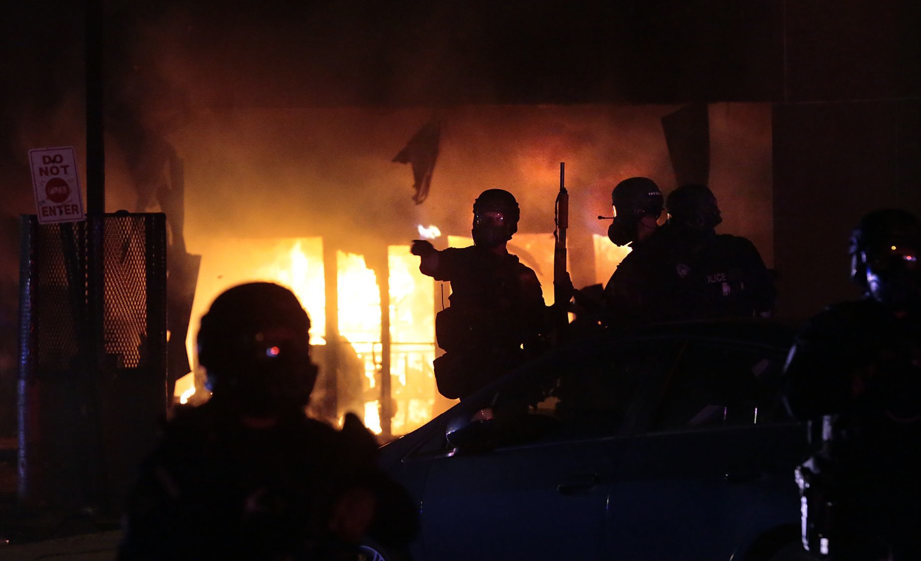 Vandals set fire to downtown 7-Eleven following protest at police station